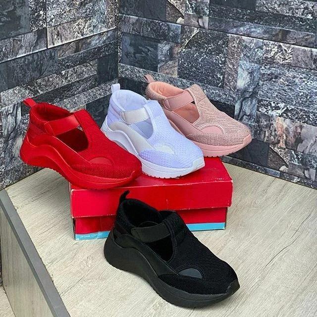 Zapatillas de deporte con colchón de aire tejido volador casual para mujer