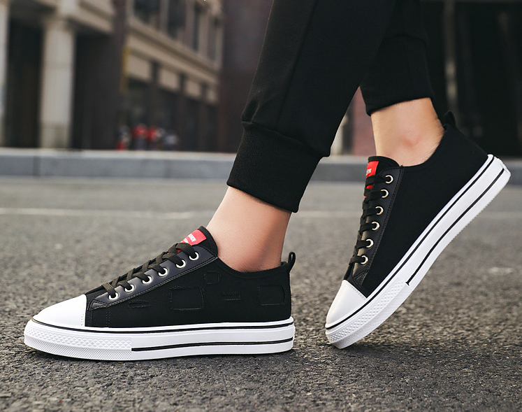 Zapatos de lonas rotas para hombre y mujer