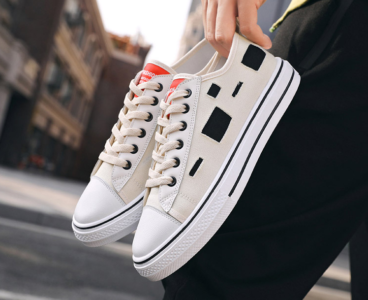 Zapatos de lonas rotas para hombre y mujer