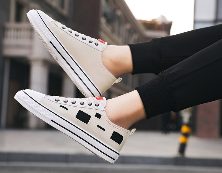 Zapatos de lonas rotas para hombre y mujer