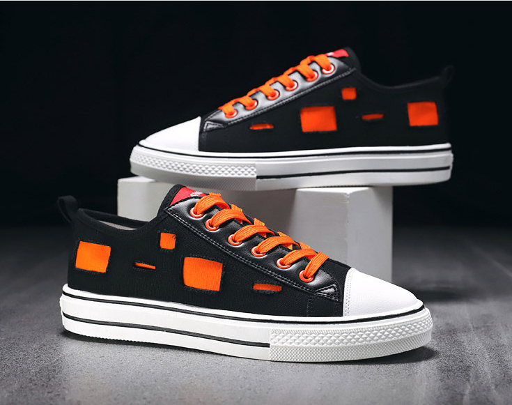 Zapatos de lonas rotas para hombre y mujer