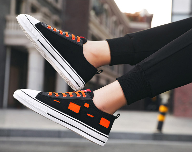 Zapatos de lonas rotas para hombre y mujer