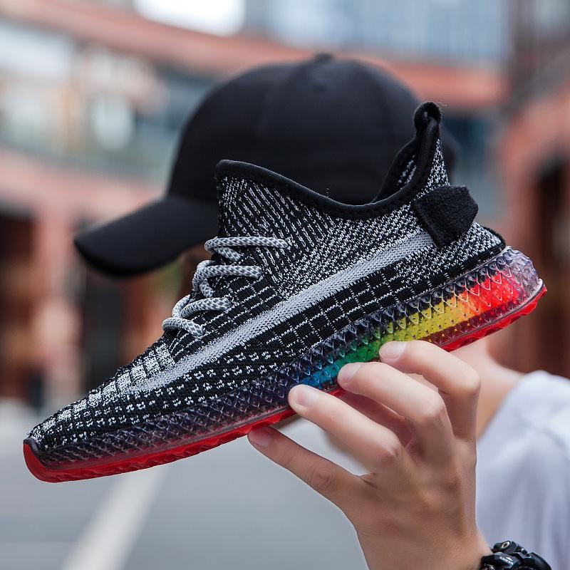 Zapatillas de deporte transpirables de tejido volador estrellado con fondo de arcoíris