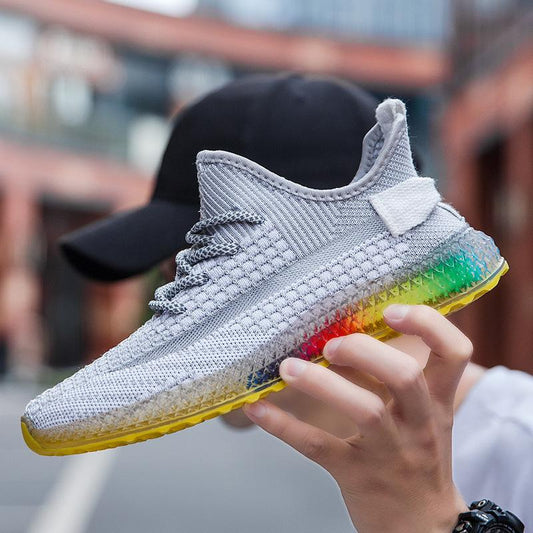 Zapatillas de deporte transpirables de tejido volador estrellado con fondo de arcoíris