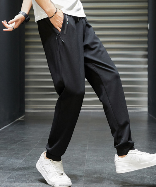 Pantalones deportivos casuales elásticos de seda helada transpirables de secado rápido