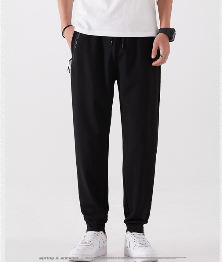 Pantalones deportivos casuales elásticos de seda helada transpirables de secado rápido