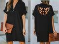 Verano nuevo vestido suelto de color sólido hueco de mariposa