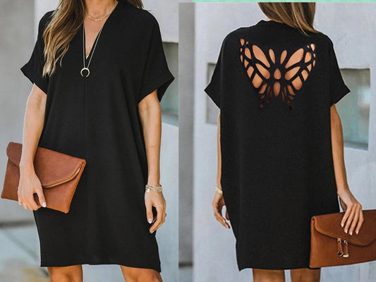 Verano nuevo vestido suelto de color sólido hueco de mariposa