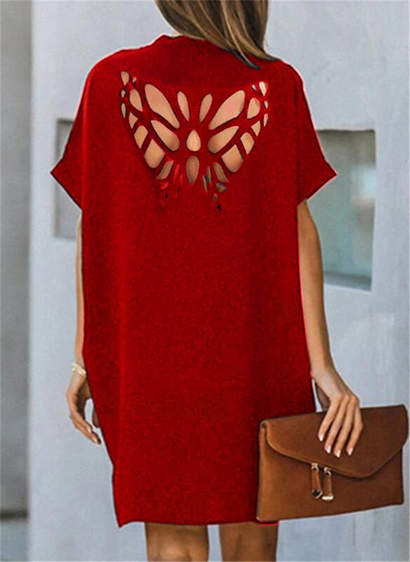 Verano nuevo vestido suelto de color sólido hueco de mariposa
