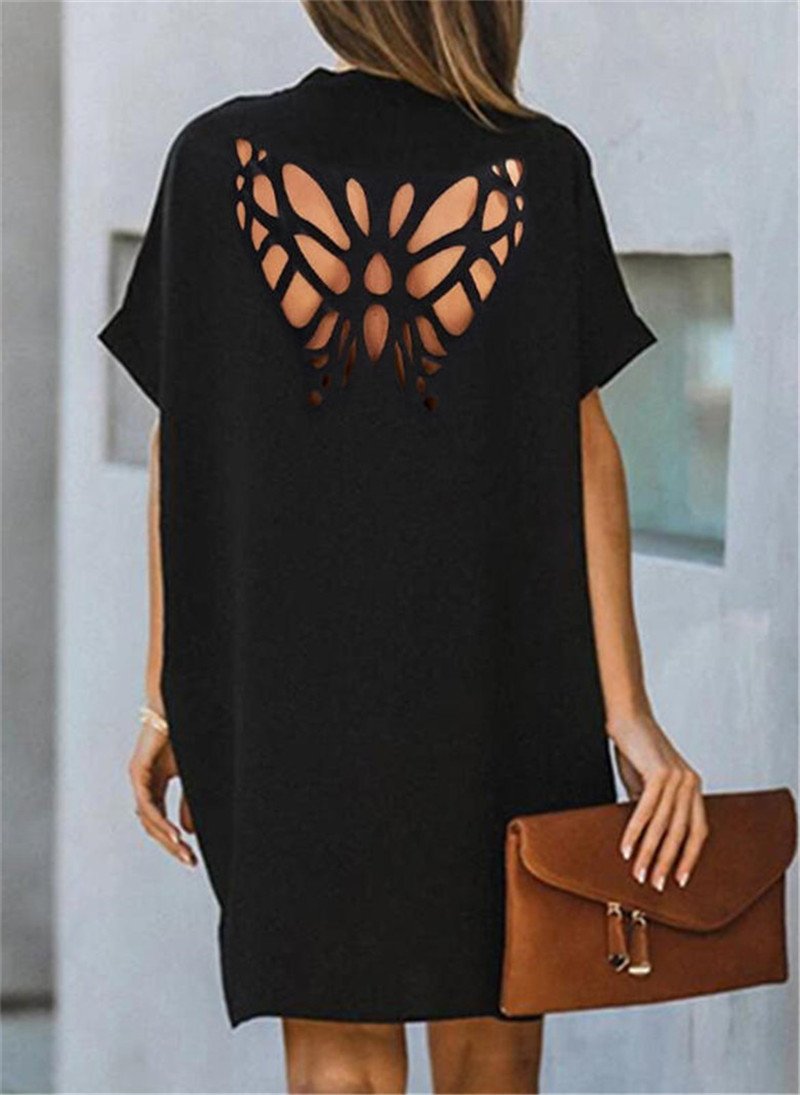 Verano nuevo vestido suelto de color sólido hueco de mariposa