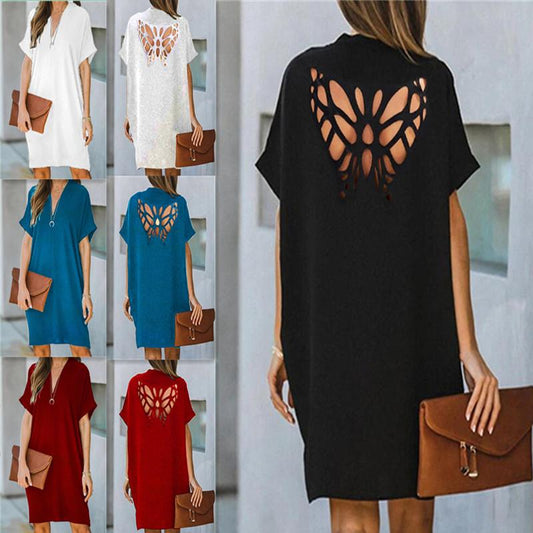 Verano nuevo vestido suelto de color sólido hueco de mariposa