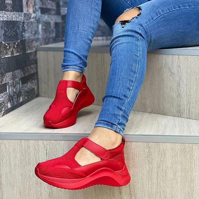 Zapatillas de deporte con colchón de aire tejido volador casual para mujer