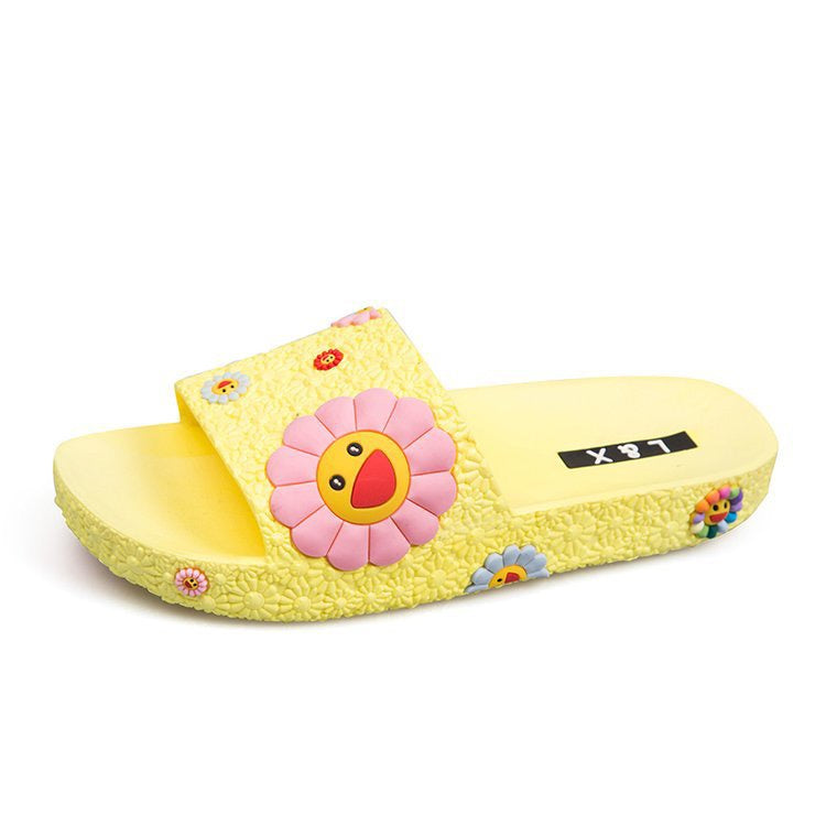 Diapositivas de playa con flores sonrientes coloridas