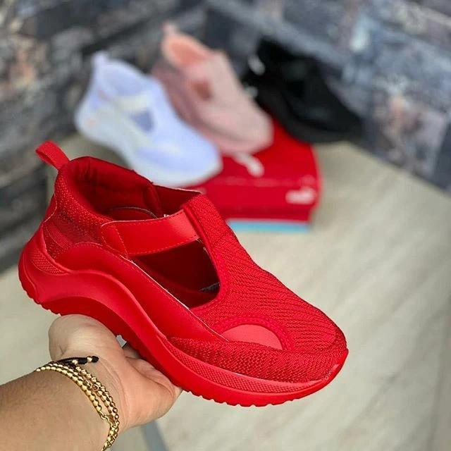 Zapatillas de deporte con colchón de aire tejido volador casual para mujer