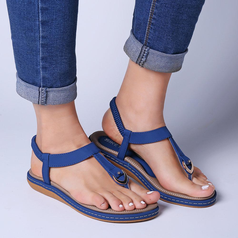 Sandalias planas elásticas